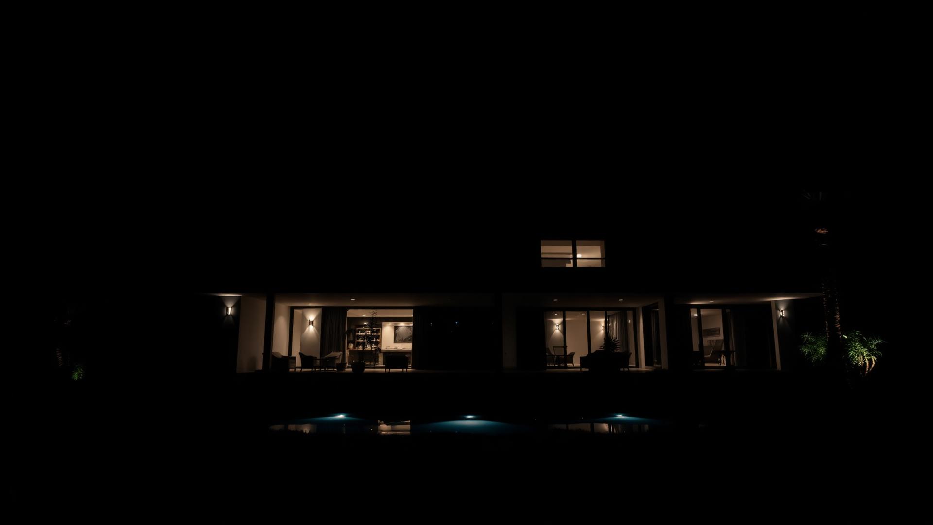 Luxury villa lit at night